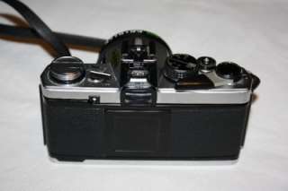   OM 2 35mm SLR Camera + Olumpus Zuiko 50mm 11.8 Lens + strap  