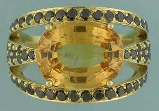 HONEY/GOLD SAPPHIRE OVAL6.11 CTSmounted in 18k ring  