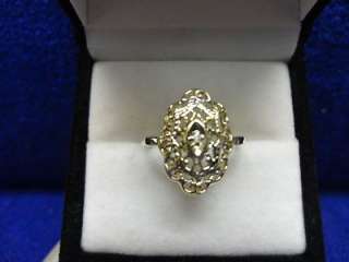 10K YELLOW GOLD DIAMOND FILIGREE RING, SIZE 7 1/4. THIS RING FEATURES 