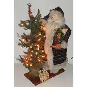  26 Santa with Lit Christmas Tree