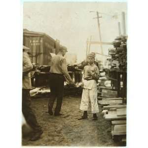  Photo Young boy working for Hickok Lumber Co., Burlington 