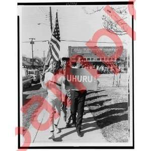   Indianola, Mississippi, 100 Negros chanting uhuru 1965