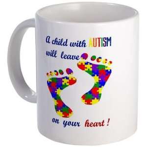    Footprints on your heart Autism Mug by 