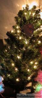 Irridescent Artificial Christmas tree pre lit w/ multi lights and 
