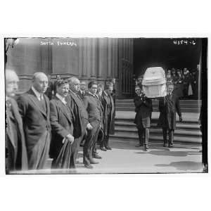  Botta funeral   carying coffin from church