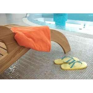  Sunbed with Orange Towel on the Armrest and Yellow Sandals 