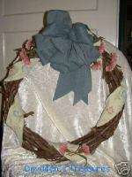 Door Wreath with Vines, Bow , Fabric and Carnations  