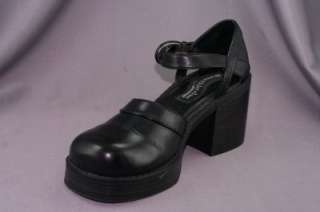 This is a pair of black clog heel leather SKECHERS Somethin Else 