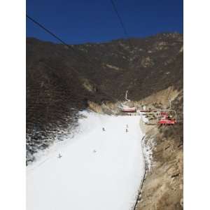  Ski Lift Taking Skiers Up to the Slopes at Shijinglong Ski 