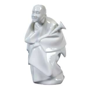  4.75 inch All White Porcelain Tibetan Monk holds Rag Dung 