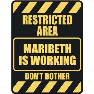   RESTRICTED AREA MARIBETH IS WORKING  PARKING SIGN