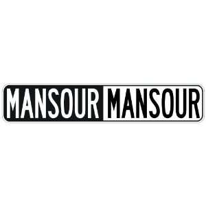   NEGATIVE MANSOUR  STREET SIGN