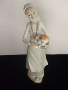   Porcelain Figurine Statue Girl holding a Puppy Dog Made in Spain