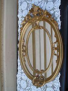 COL MS GOLD DECORATOR OVAL MIRROR ITALY  