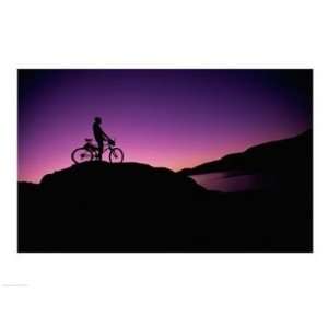   with his mountain bike, Lake Powell, Utah, USA  24 x 18  Poster Print