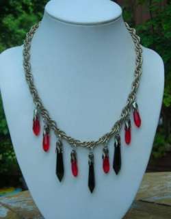 This is an absolute one of a kind necklace hand crafted from vintage 