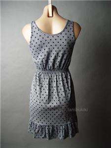 Gray and black polka dot dress with a sweet, retro inspired appeal 