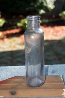 Large LBC Embossed Clear and Purpling Antique Medicine Style Bottle 