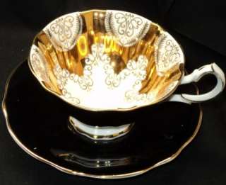 Queen Anne GLOSSY BLACK FANTABULOUS GOLD Tea cup and saucer  