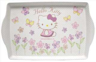   tray with adorable Hello Kitty with adorned flowering shrubs