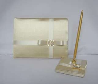   the gold guest pen holder is decorated with same beautiful details