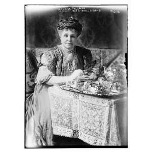 Mrs. George Pullman,at tea table,copyright by Harris & Ewing / Harris 