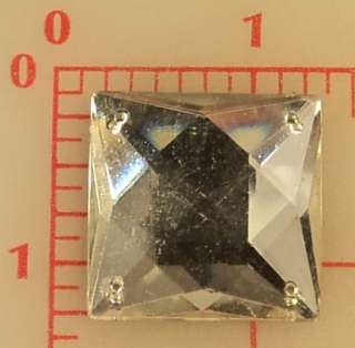 This is a beautiful vintage large glass flatback faceted square. It 