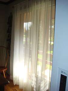CURTAINS 2 PANELS OF SHEER WHITE POLYESTER 60 X 84 EACH PANEL USED 