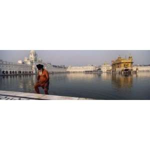  Man Coming Out of a Pond, Golden Temple, Amritsar, Punjab, India 