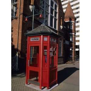 A Red Phone Booth and Victorian Architecture Premium 
