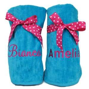  Monogrammed Beach Towels Tied with Polka Dot Ribbon